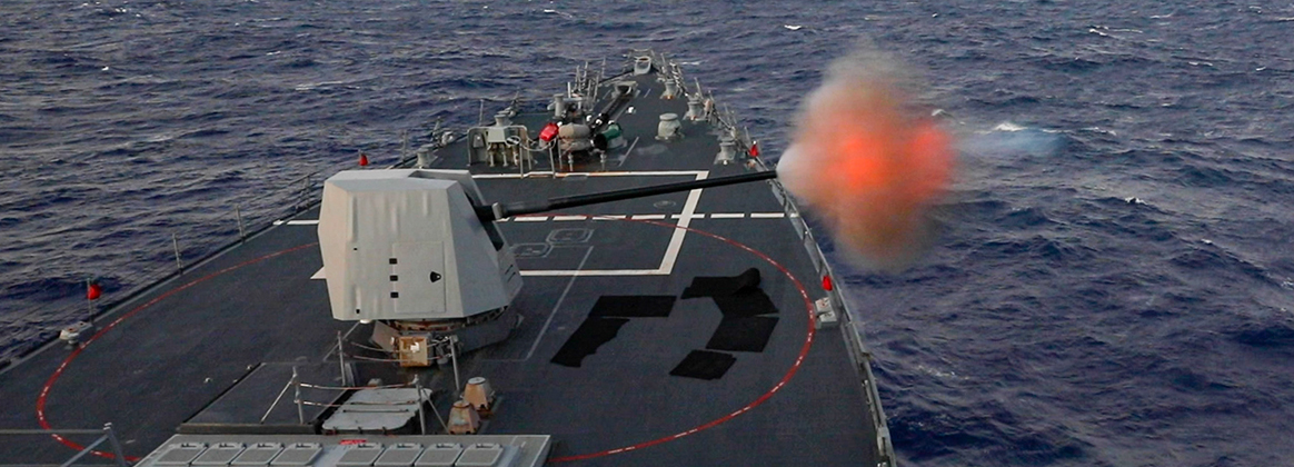 USS Dewey (DDG 105) fires its Mark 45 5-inch lightweight gun during a live-fire exercise while operating in the Philippine Sea, Dec. 1, 2023.